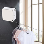 Wall-mounted retractable clothesline holding garments