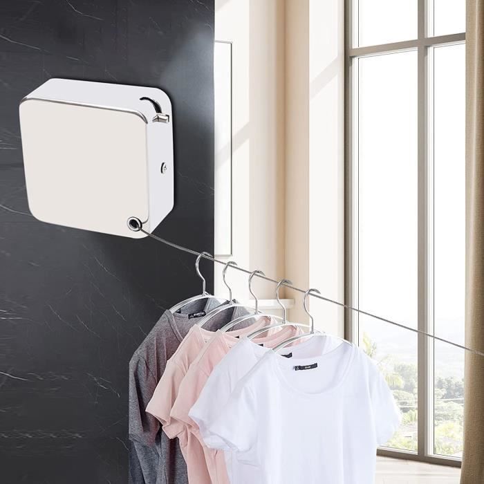 Wall-mounted retractable clothesline holding garments