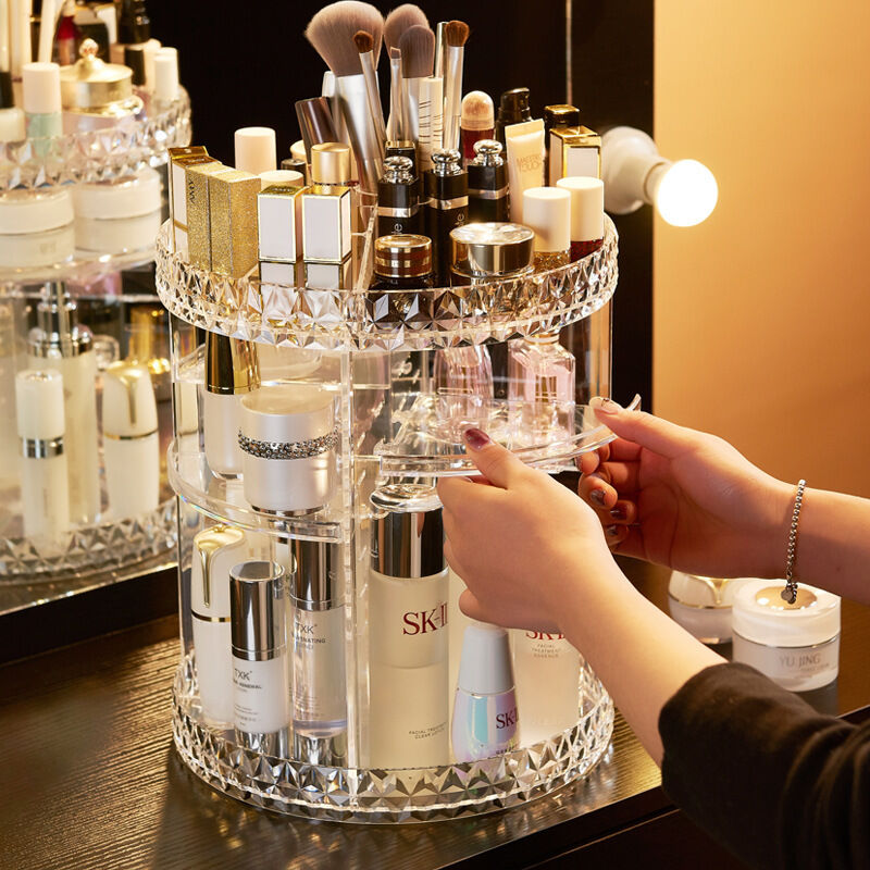 360 degree rotating acrylic makeup organizer in use on a vanity
