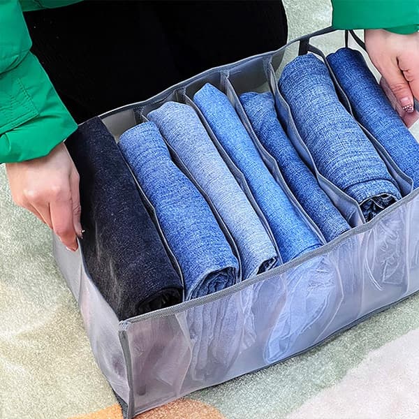 Foldable wardrobe grid organizer filled with jeans