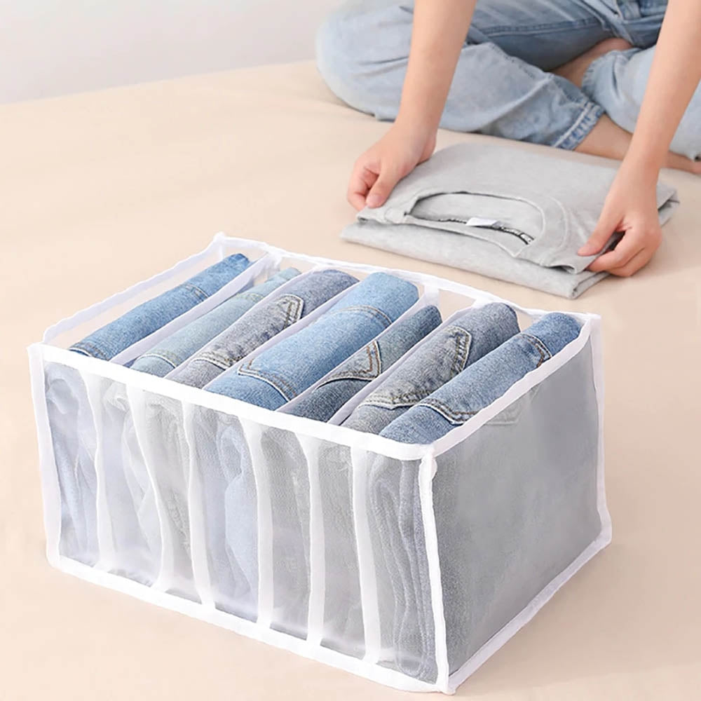 Foldable grid wardrobe organizer storing rolled jeans